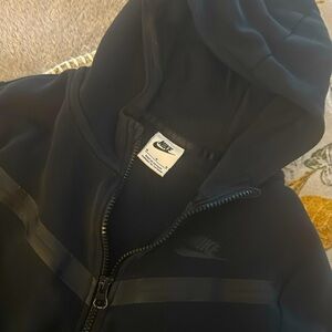 Popular youth nike tech full zip jacket.